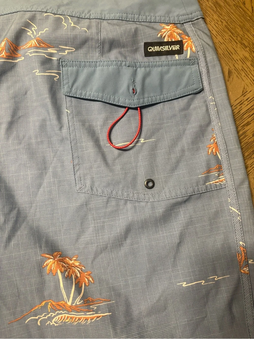 Quiksilver Light Blue Boardshorts with Orange Island Print